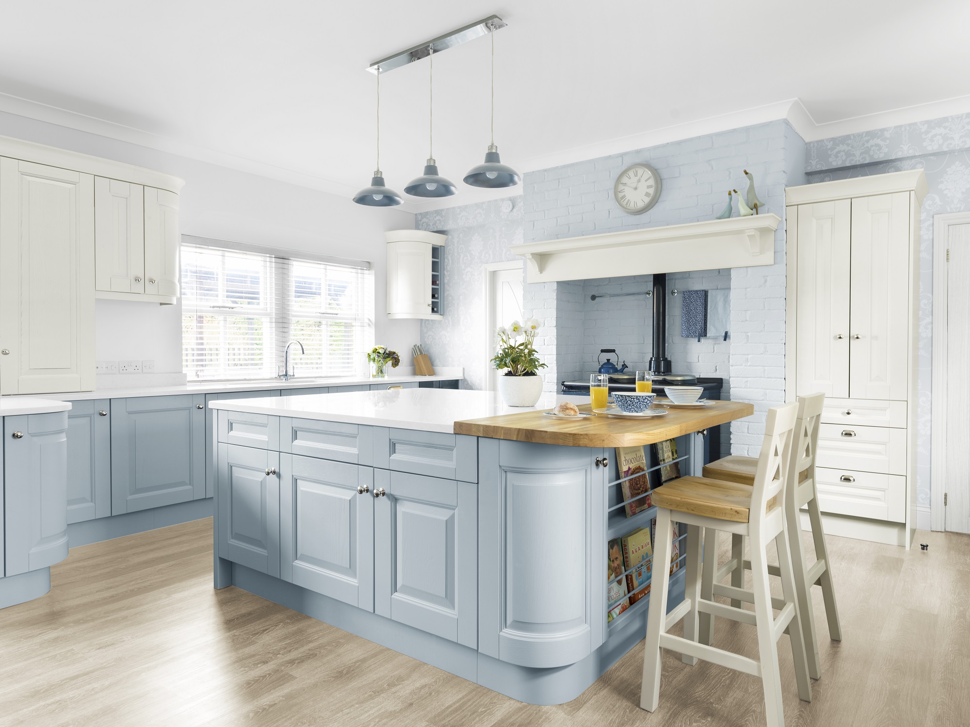 Kitchen area with island bay and classic light blue cabinets